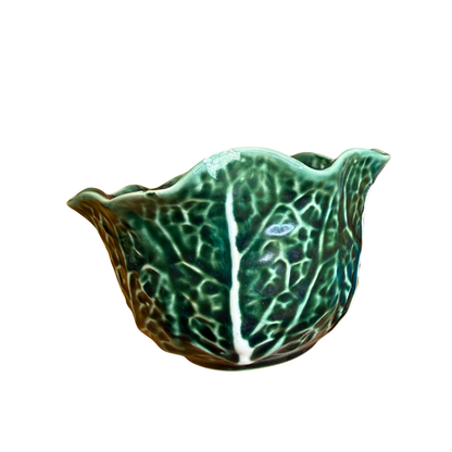 Chou en barbotine avec sa petite cuillère en bois et son dessous