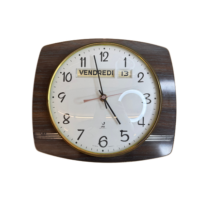 Ancienne pendule murale Jaz – transistor et formica