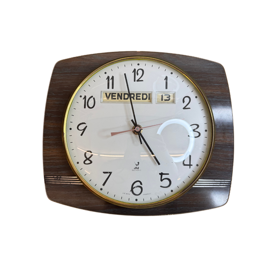 Ancienne pendule murale Jaz – transistor et formica