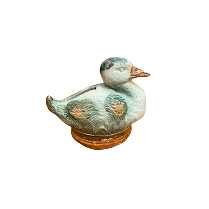 Petit canard tirelire à casser en barbotine (années 50/60)