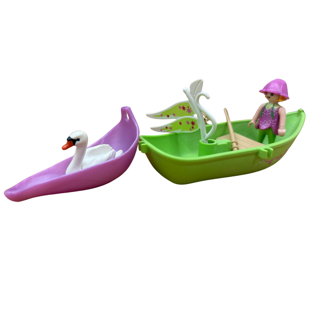 Lot Playmobil avec fée, bateau, cygne et accessoires